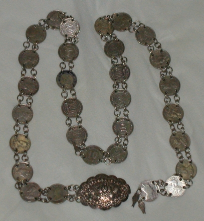 Peranakan silver coin belt with flower buckle.