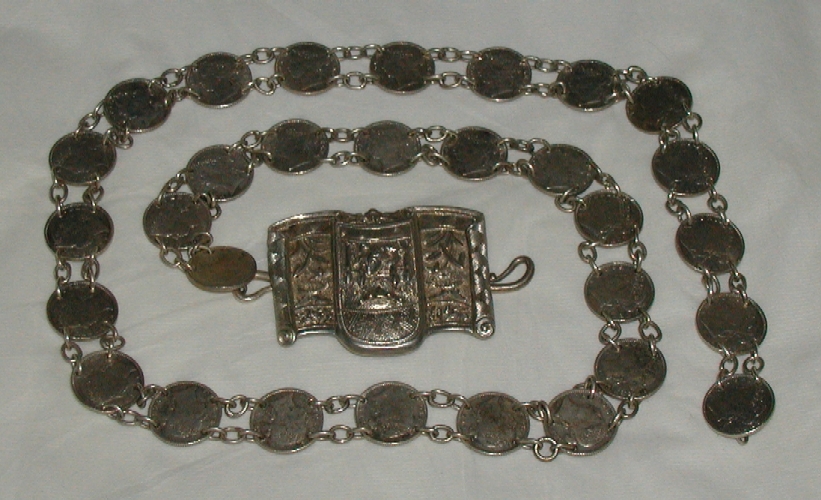 Peranakan silver belt with coins.