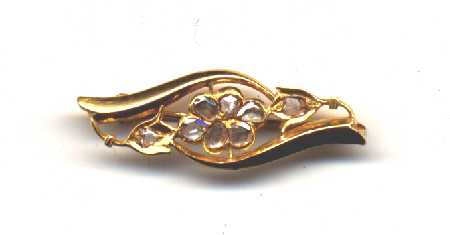 Old gold bBrooch with marvelous stones.